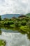 View of Thimphu dzong from Ludrong park with a lake