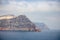 View of Thirasia from sea next to Santorini, Greece