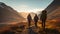 View of three backpackers walking up the mountain in beautiful remote arctic wilderness