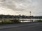 View of Tjornin Pond Promenade with the Frikirkjan and Hallgrimskirkja churches and Town hall in Reykjavik, Iceland. Evening dusk