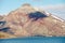 View to the abandoned Russian arctic settlement Pyramiden with the natural mountain in the form of pyramid above, Norway.