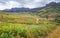 View to Andringitra massif as seen during trek to Pic Boby Imarivolanitra, Madagascar highest accessible peak, few small houses on