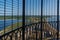 View to the Baltic sea and SÃµrve peninsula through the protective grid  and railings from top of the SÃµrve lighthouse