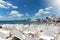 View to the beach of Naousa with tables and benches on the island of Paros