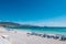 View to beautiful Albir seaside beach with beach chairs and umbrellas. Albir is small resort city near Mediterranean sea