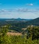 View to Berzdez hill from Ronov castle ruins above Blizevedly village in Czech republic