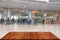 View to blurred scene in the airport from dark boards or table