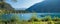 View to campsite lake achensee with sailboats, landscape panorama austria