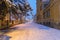 View to the Cetatii street in the historical center of Sibiu on a winter evening in Transylvania Region, Romania