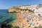 View to coastline and beautiful portuguese beach Praia de Carvoeiro near Lagoa in summer, Algarve Portugal