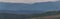 View to distant hill with dead trees from Tristolicnik. Outdoor and landscape background. Sumava National Park and Bavarian Forest