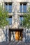 View to entrance door of a modern residential building with new apartments in the city