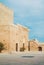 A view to entrance of medieval moorish fortress Alcazaba in Almeria and beautiful blue sky on the background, Andalusia, Spain.