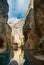 A view to Guadalevin river at El Tajo Gorge Canyon from the bottom of the secret water mine in Ronda, one of the most famous whit