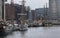 View to harbor with moored many tourist sailboats in \'HafenCity\' district of Hamburg.