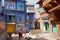 View to the historical traditionally blue painted old residential area buildings in Jodhpur, India.