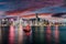 View to the illuminated skyline of Victoria Harbour in Hong Kong
