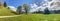 View to Inntal and Wilder Kaiser mountain range in the Alps, Building land for new construction project on green sunny meadow,