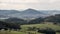 View to Koprivnice city with Bila hora and other hills of Podbeskydska pahorkatina mountains around from Hukvaldy castle ruins in