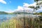 View to lake Attersee with sailing boat, Mountains of austrian alps near Salzburg, Austria Europe