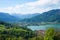 View to lake Tegernsee and castle, alpine spring landscape upper bavaria