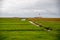 View to the lighthouse Westerheversand with Priel in the foreground