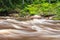 view to the Mountain river with Flowing Water Stream and sandstone cliffs