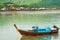 View to old wooden Old Town houses, long tail boat, Koh Lanta, Krabi, Thailand