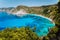 View to Petani bay with transparent crystal clear blue azure mediterranean sea water in beautiful beach lagoon in summer