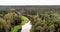 View to the pinewood treetops and winding Sventoji River