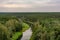 View to the pinewood treetops and winding Sventoji River