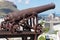 View to the pld cannon at the entrance to the Fort Adelaide overlooking the city in Port Louis, Mauritius.