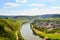 View to river Moselle and Marienburg Castle near village Puenderich - Mosel wine region in Germany