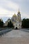 View to the road and entrance gate of Nilov Monastery on Stolobny Island, lake Seliger, Ostashkov, Russia