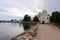 View to the road and entrance gate of Nilov Monastery on Stolobny Island, lake Seliger, Ostashkov, Russia