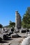 View to the ruins of ancient temple of Athena in archaeological site Priene, Turkey with marble column fragments on the foreground