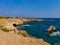 View to sea cave and stone cliffs near `bridge of lovers`