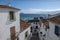 View to the sea in lane with typical white spanish houses in Altea, Costa Blanca