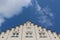 View to the sky and the top of a white magnificent historical building in the Maximilian street in Augsburg, Germany