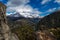 View to the small lagoon between the mountains from behind a big rock in Futaleufu