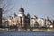 View to St. Pokrovskiy Cathedral Intercession and apartment buildings on Obolon embankment in Kyiv, Ukraine. March 2020