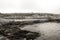 A view to Tananger suburb and rocky coast at Sjobadet Myklebust swimming area early in the morning, Tananger