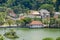 View to the Temple of the Tooth Sri Dalada Maligawa with golden roof reflecting the sun in Kandy, Sri Lanka.