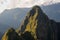 View to top of Huayna Picchu with terraces, Machu Picchu - Peru