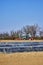 View to tractors and machines that are ready to prepare an asparagus field in Germany for cultivation