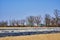 View to tractors and machines that are ready to prepare an asparagus field in Germany for cultivation