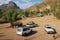 View to a traditional Ethiopian village with tourist cars parked at the foreground in Adwa, Ethiopia.