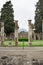 View to Vesuvius from ancient ruined Italian Roman Pompei, vertical columns, walls