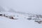 View to the Village of Churwalden, Switzerland, in foggy Wintertime