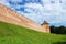View to Vladimir tower and wall of the Velikiy Great Novgorod citadel kremlin, detinets in Russia under blue summer sky in the
